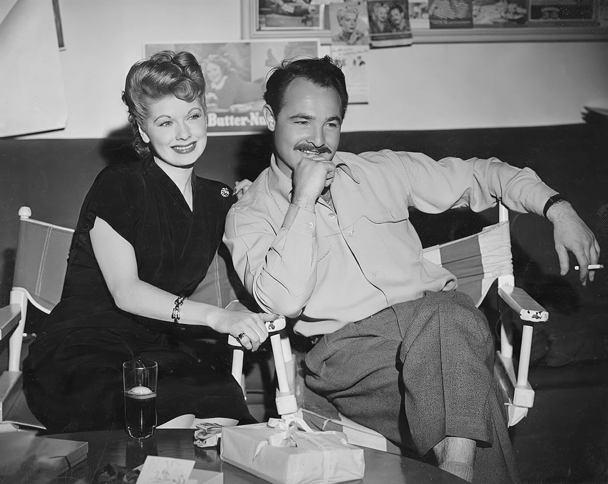 Lucille Ball and Tom Kelley share a candid moment between takes, showcasing the lighter side of studio life. Lucille Ball and Tom Kelley share a candid moment between takes, showcasing the lighter side of studio life.